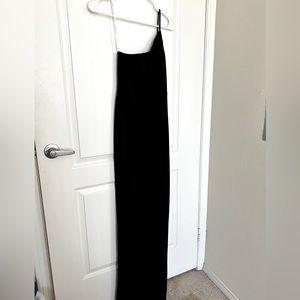 Size Small, never worn, black floor length dress with slit, tags still on